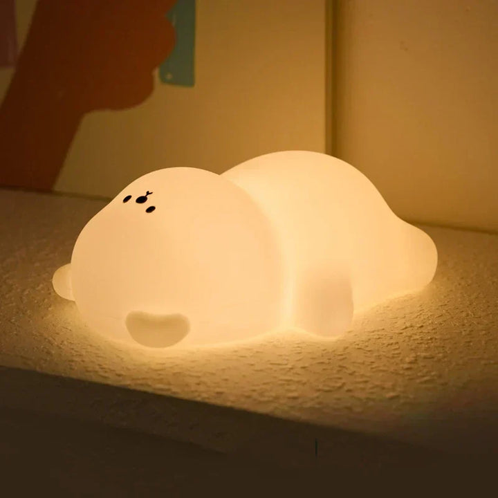 Cute DreamBear LED night light for kids. Soft silicone, warm glow, perfect for nursery decor.