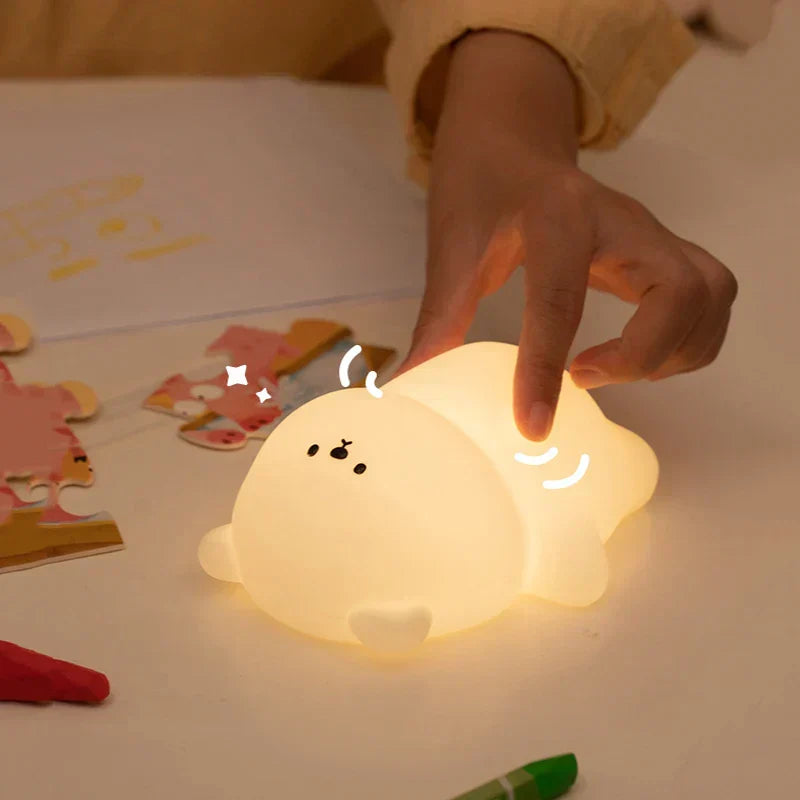 Adorable toddler bear night light. Portable & squishy silicone, touch-activated for a comforting glow.