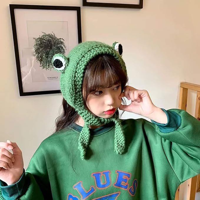 Cozy knitted frog ear warmer headband, ideal for keeping warm in winter