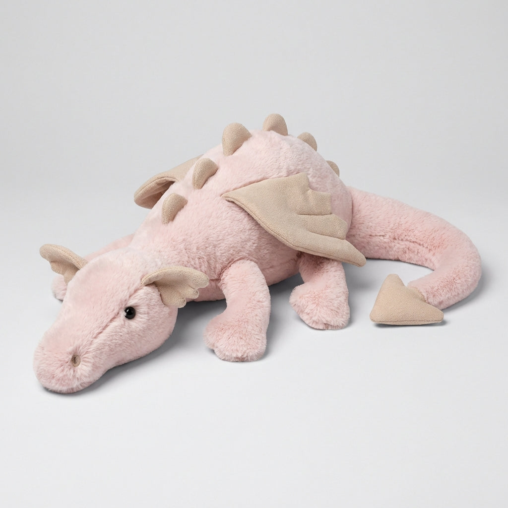 Soft fantasy dragon plush with adorable wings, perfect for a child's nursery or as a cuddly playroom toy.
