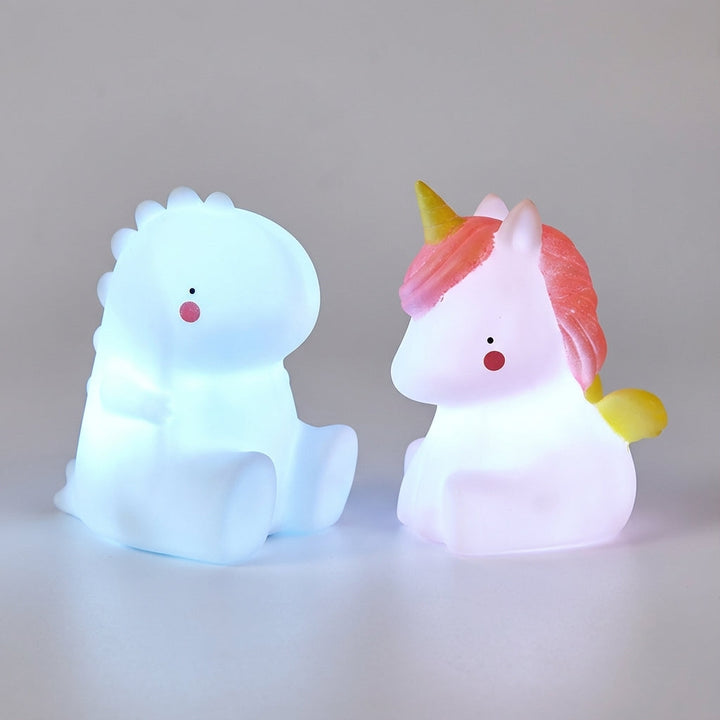 Adorable dinosaur animal LED night light, Dreamasaur for kids' bedtime, perfect children's room decor & comfort.