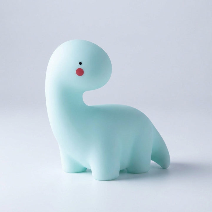 Bedtime comfort: Kids' cute animal LED night light, Dreamasaur, a soft glow bedside lamp for nursery decor.