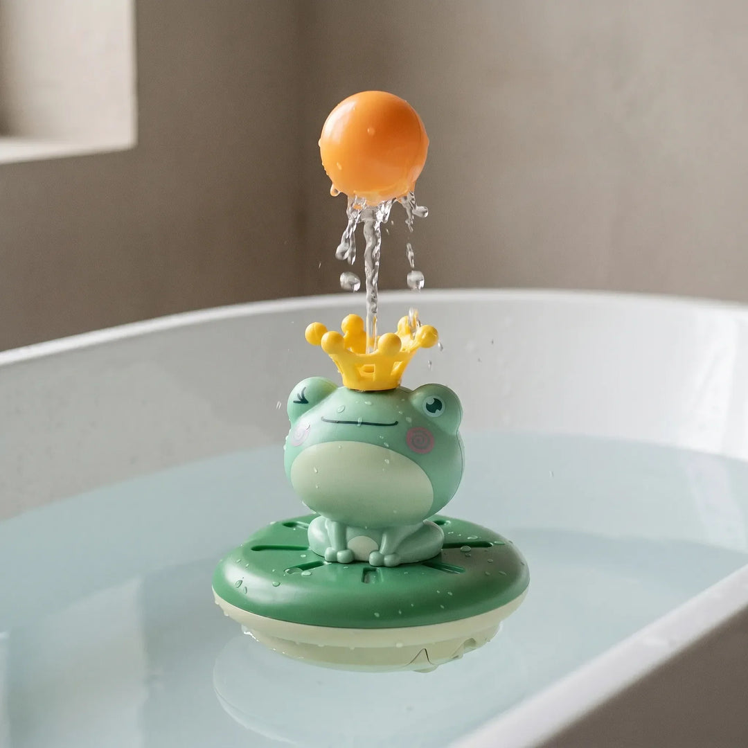 Cute green floating frog bath sprinkler toy for toddlers. Interactive water fun for kids' bath time play.