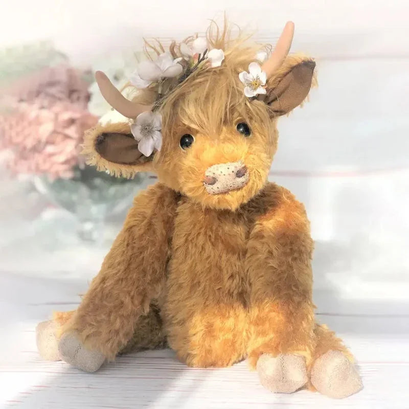 Handmade alpaca Highland cow stuffed animal with a beautiful floral headband, a soft and unique farm animal plush.