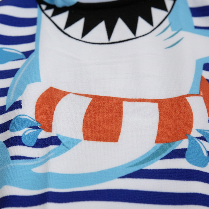 Children's quick-dry hooded towel, AdventureTowel animal print, ideal for after swimming at the beach.