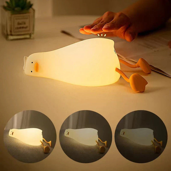 Cute silicone duck LED night light for children's nursery, providing a gentle glow for peaceful sleep.