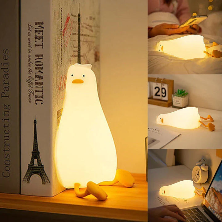 Adorable QuackLite duck night lamp for kids, soft silicone and LED, perfect for bedside and sleep aid.