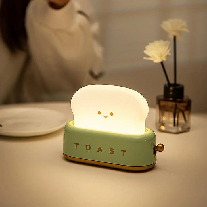 Adorable dimmable LED toast night light with timer function. Rechargeable ToastieGlow lamp, ideal for kids' rooms.