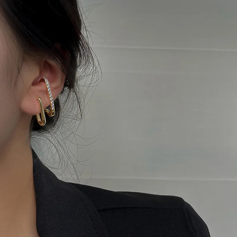 Elegant gold-plated crystal stud earrings with a dainty claw design. Ideal hypoallergenic women's fashion jewelry.