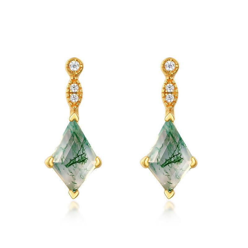White zircon accents on a women's natural moss agate jewelry set, subtle sparkle.