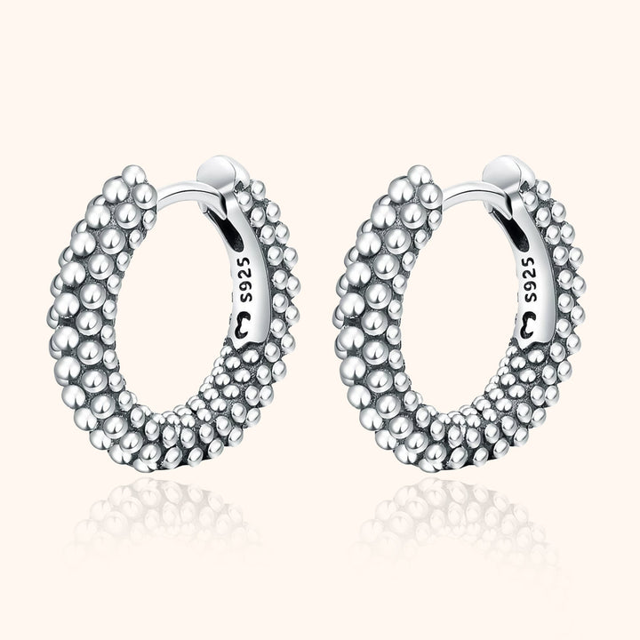 Dainty pearl hoop earrings for women, gold-plated sterling silver. Elegant, minimalist everyday wear jewelry.