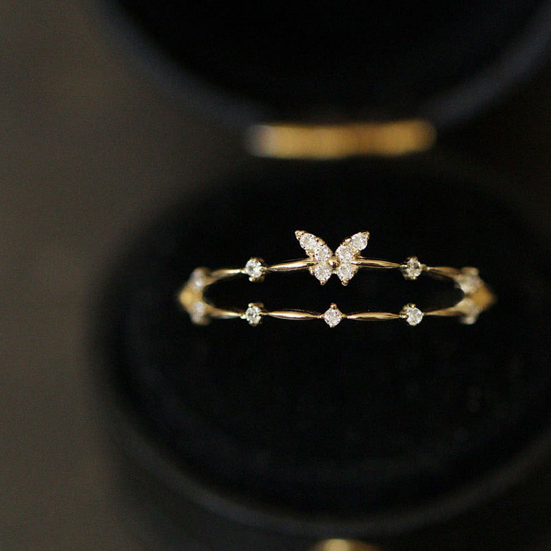 Elegant women's butterfly ring featuring brilliant zirconia gems on S925 silver, a beautiful fashion statement.