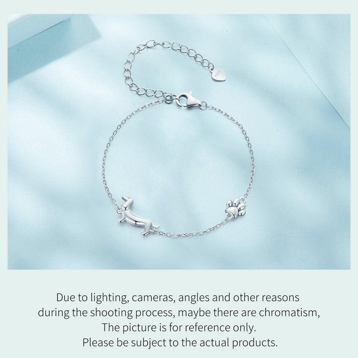 Adjustable women's silver dachshund dog charm bracelet, stylish animal jewelry for daily wear.