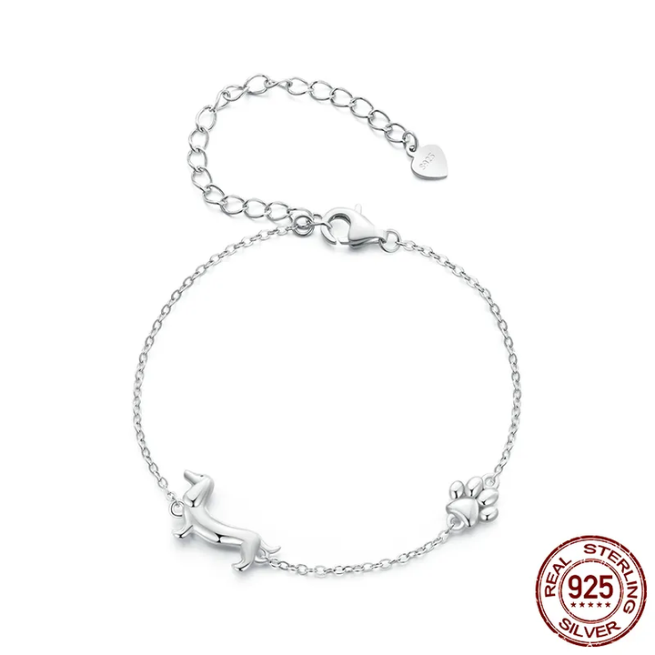 Women's silver dachshund dog charm bracelet. Dainty, adjustable animal jewelry for dog lovers.