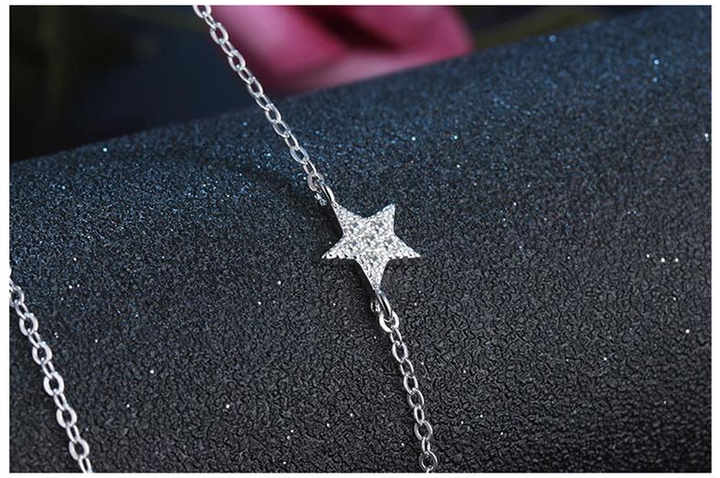 Silver star necklace in a gift box, a perfect dainty jewelry gift idea for women's everyday elegance.