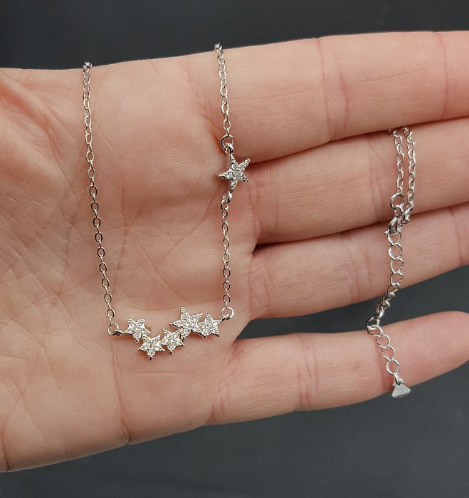 Adjustable silver star necklace with secure clasp, ensuring a perfect fit for women's daily wear.