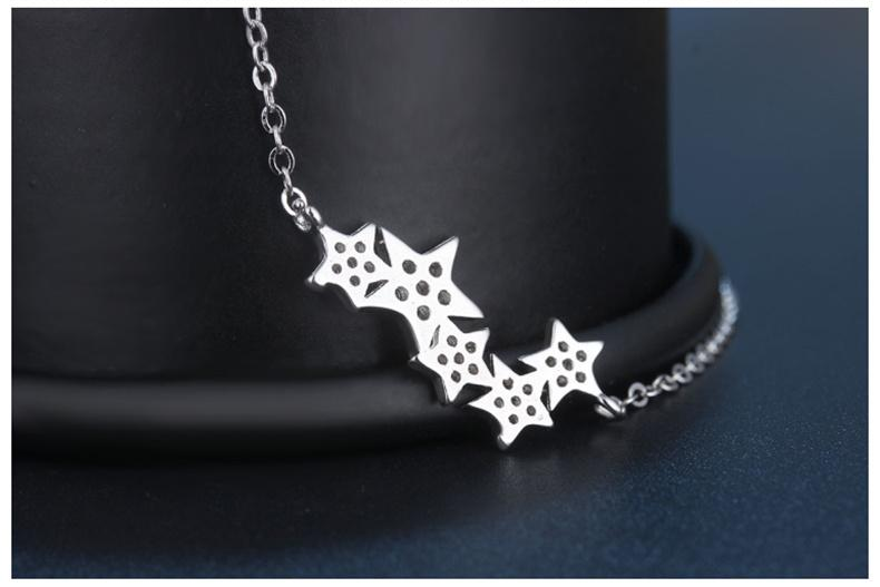 Sparkling sterling silver star necklace, a dainty and elegant piece of women's star jewelry.
