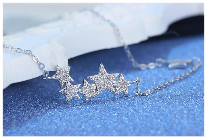 Versatile dainty silver star necklace, enhancing any outfit with its elegant and timeless design.