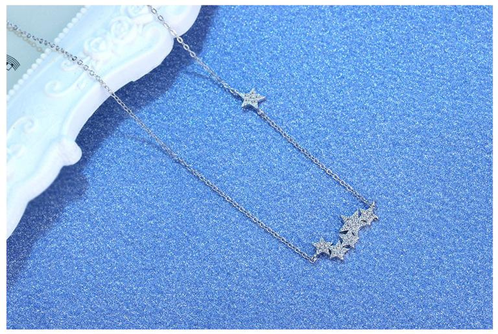Minimalist silver star necklace for women, a simple yet elegant piece of dainty everyday jewelry.