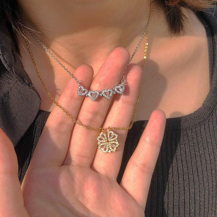 Women's elegant four-leaf clover necklace, a beautiful sterling silver good luck charm for any occasion.