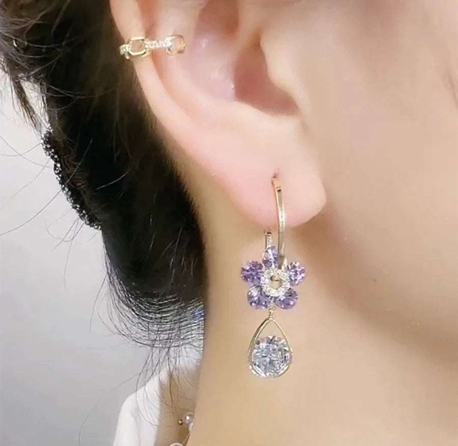 Dainty crystal flower stud earrings for women, a sparkling and elegant gift for her. Perfect fashion jewelry.