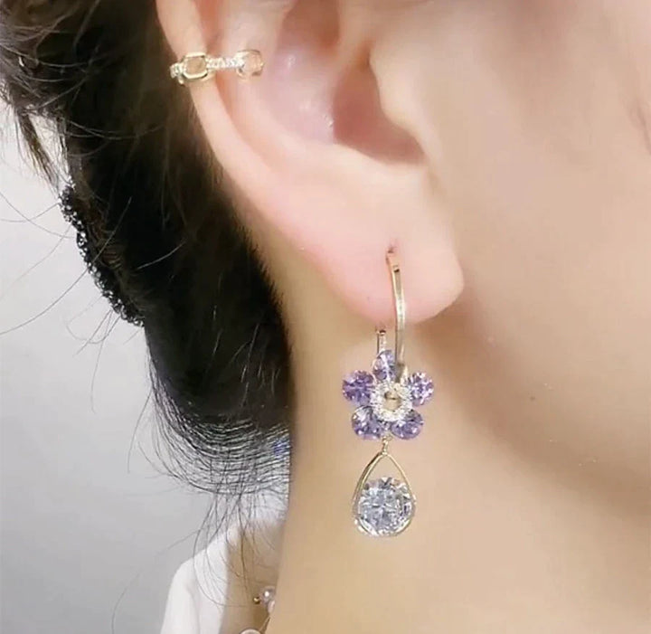 Dainty crystal flower stud earrings for women, a sparkling and elegant gift for her. Perfect fashion jewelry.