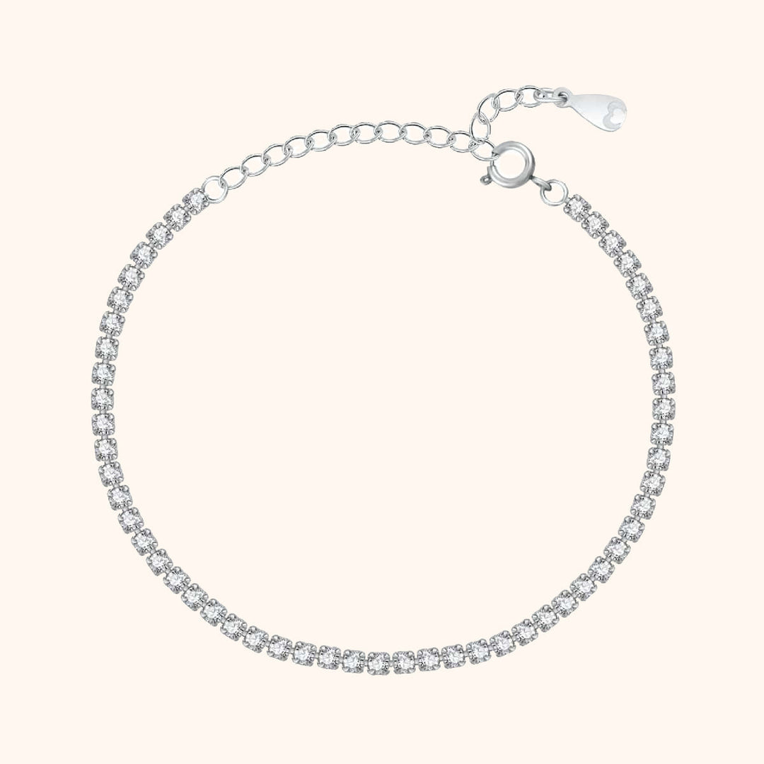 Women's sparkling square link bracelet. Dainty, adjustable chain jewelry in silver or gold plated finish.