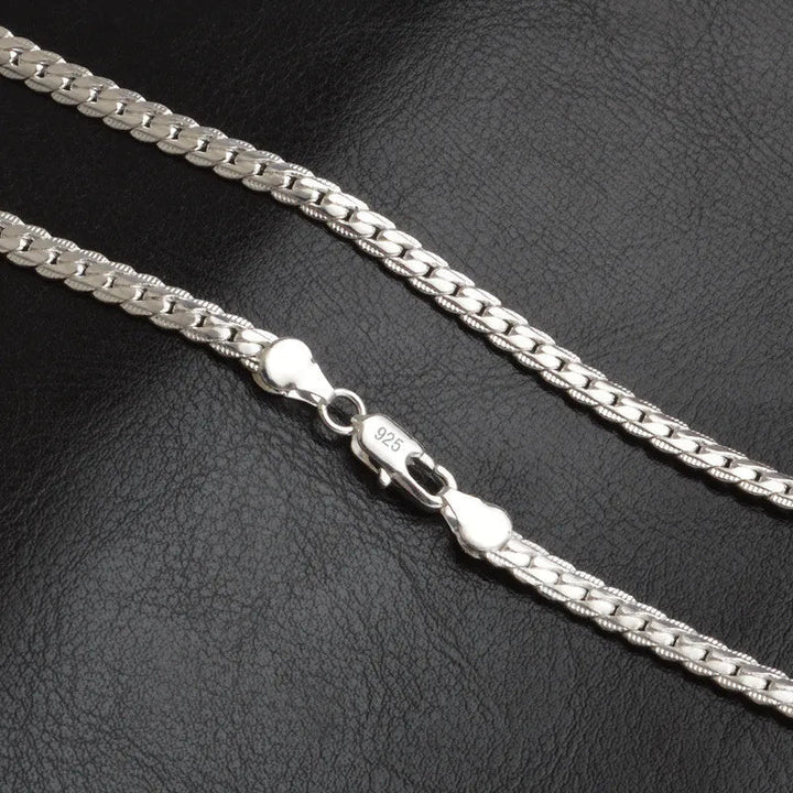 Elegant women's sparkling sterling silver chain necklace. Dainty jewelry, perfect for any occasion or a gift.