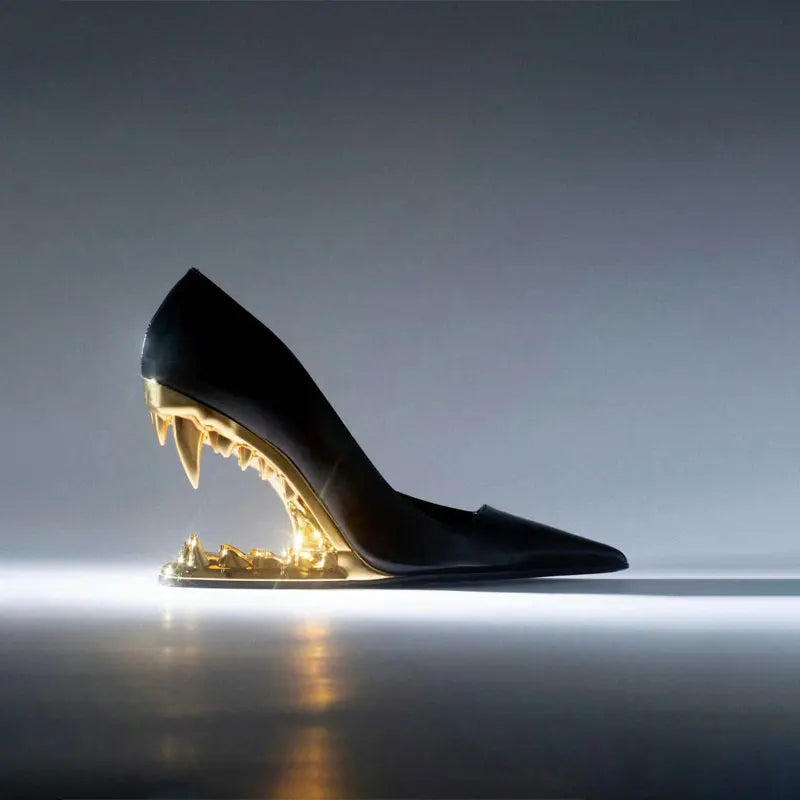 Bold women's tiger fang heels. Daring black sculpted jaw design with golden fangs for a fierce statement.