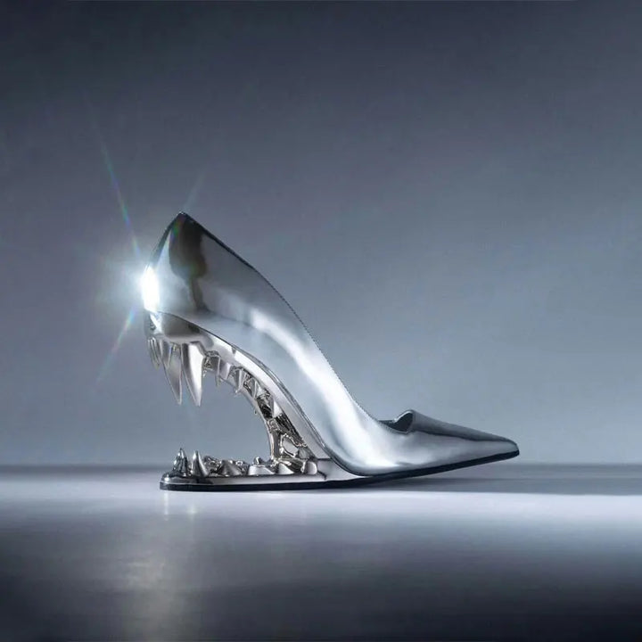Luxury black tiger fang heels for women. Fashion-forward sculpted jaw design with golden fangs, ideal for special nights.