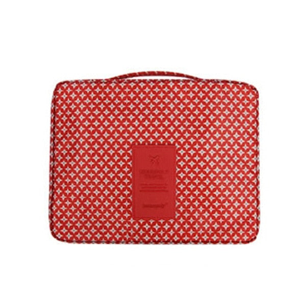 Floral dark blue waterproof makeup organizer travel bag, highly portable.