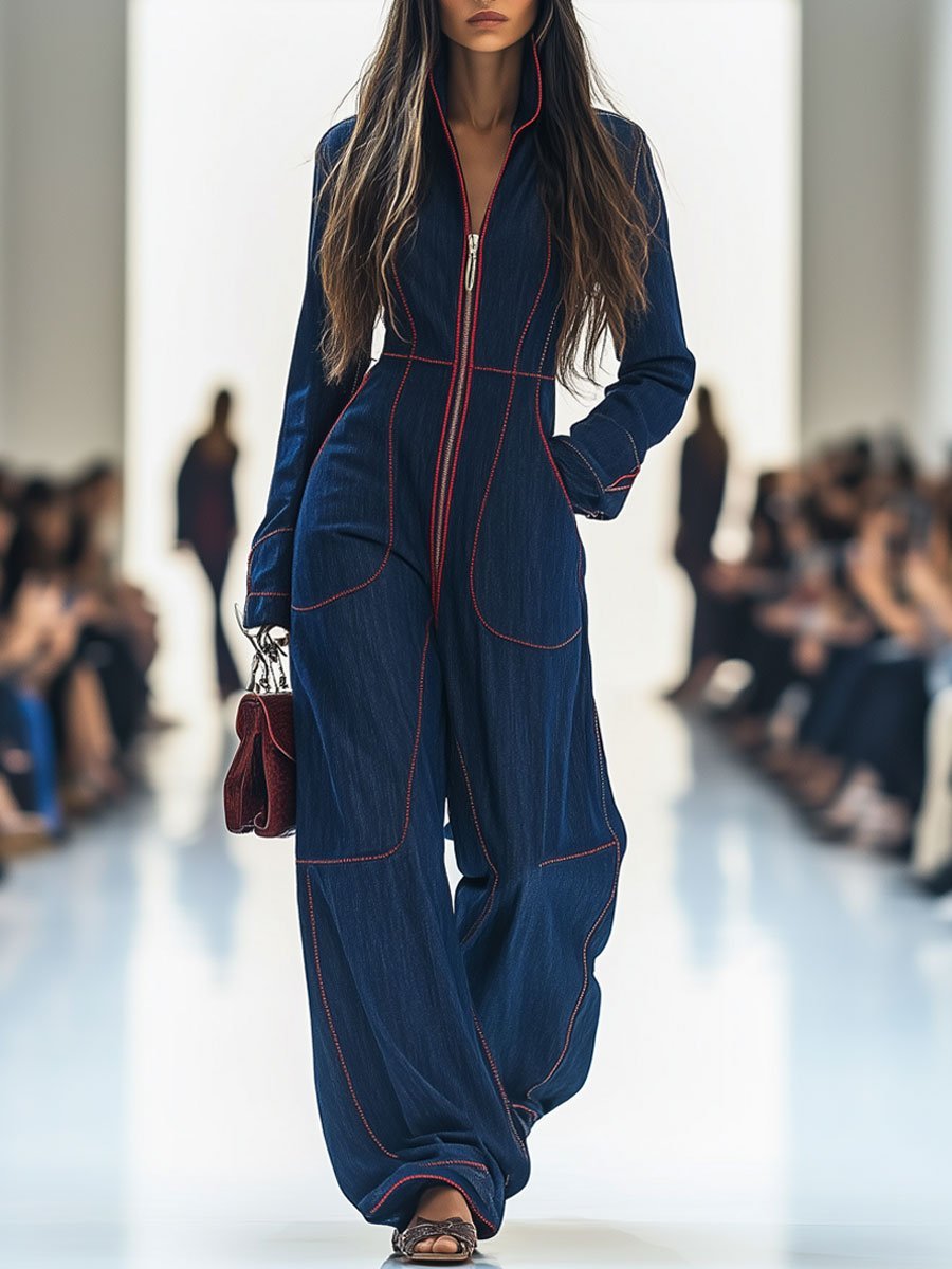 Dark blue wide leg women's jumpsuit with zip front, perfect for a chic and versatile look.