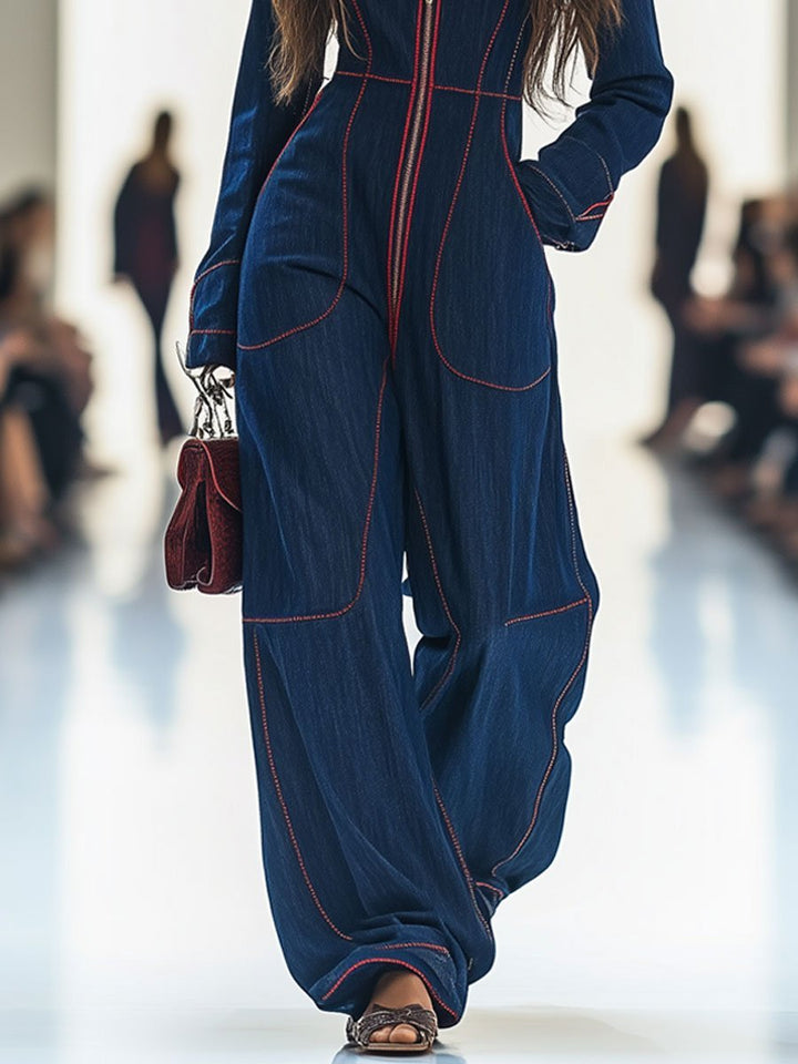 Chic dark blue wide leg women's jumpsuit, offering comfort and style with its modern zip front.