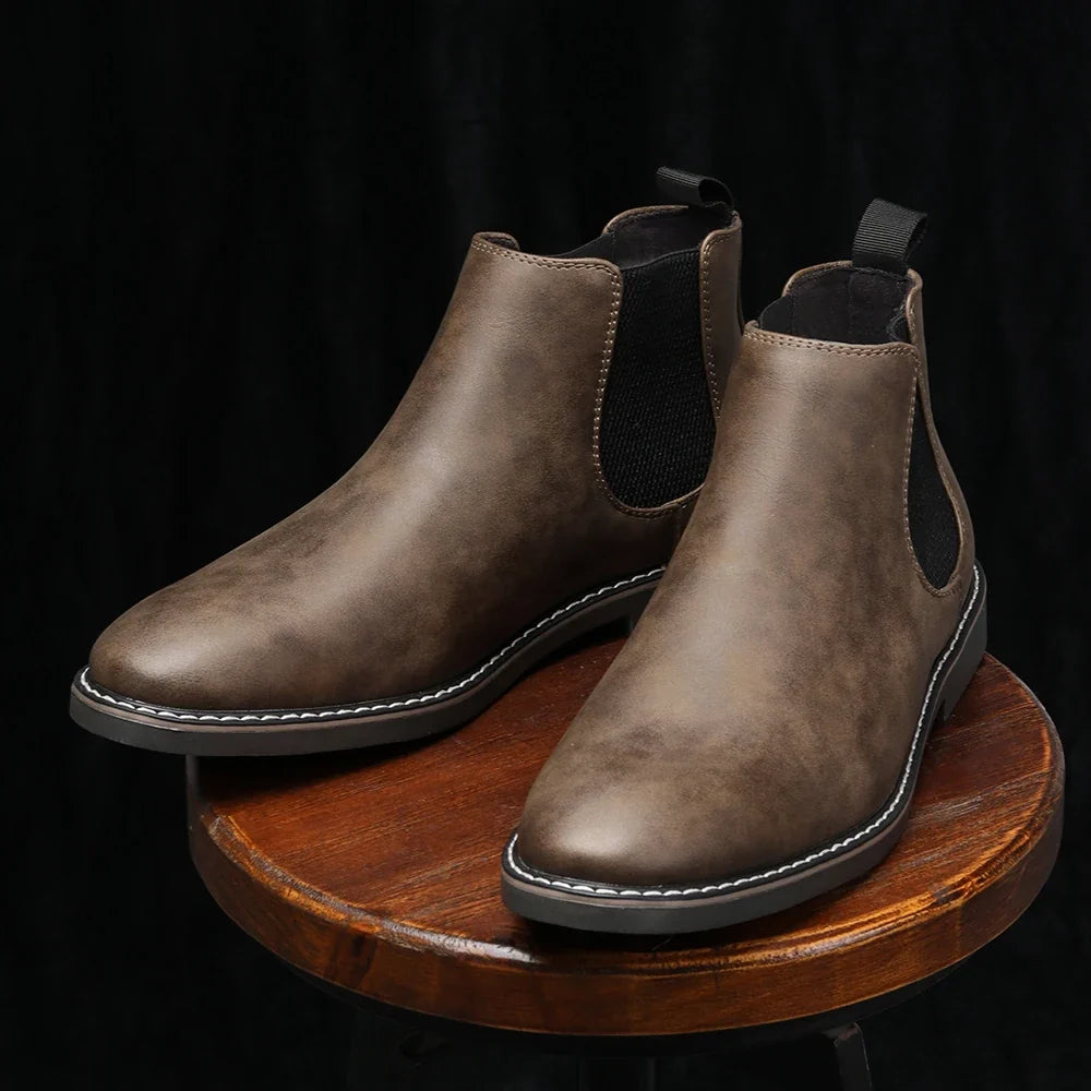 Comfortable slip-on men's Chelsea boots in black, offering excellent ankle support and modern style.