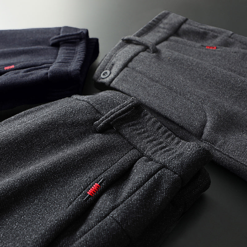 High-quality men's dark gray slim fit stretch trousers, built for comfort & lasting style.