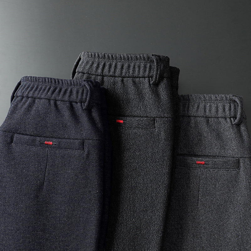 Stylish men's slim fit stretch trousers in black, blue & dark gray for versatile wear.