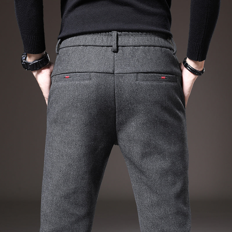 Front view of men's dark gray slim fit stretch trousers, showcasing comfortable & smart design.
