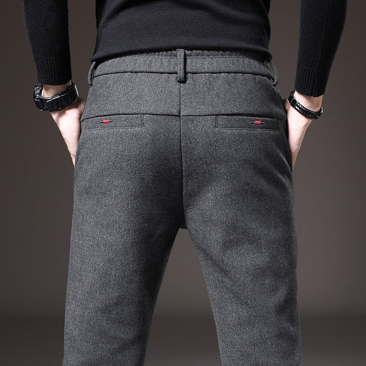 Front view of men's dark gray slim fit stretch trousers, showcasing comfortable & smart design.