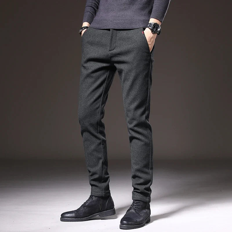 Blue men's slim fit stretch trousers, comfortable and stylish for everyday wear.