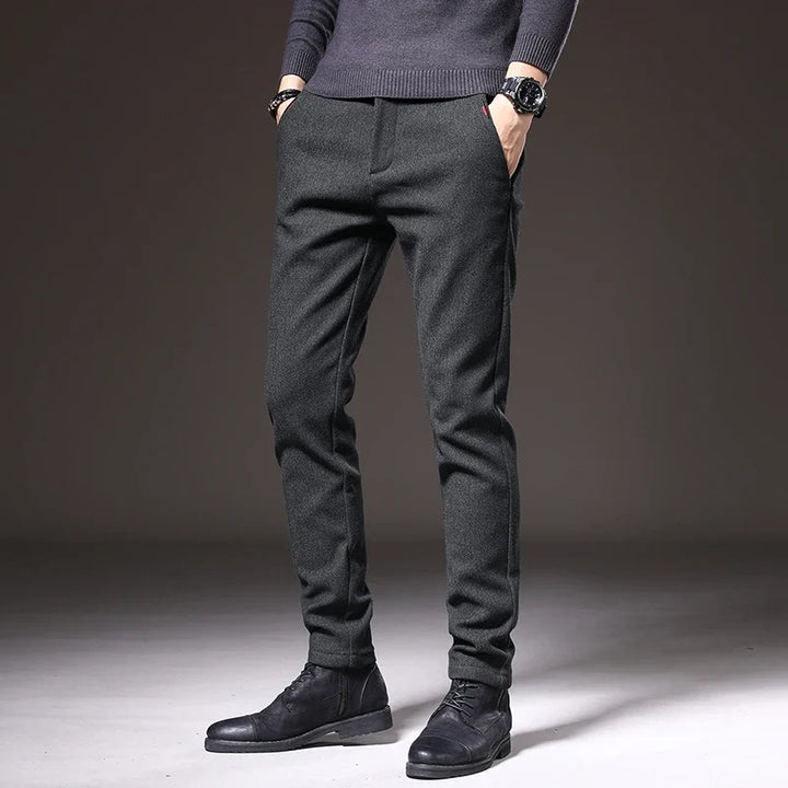 Blue men's slim fit stretch trousers, comfortable and stylish for everyday wear.