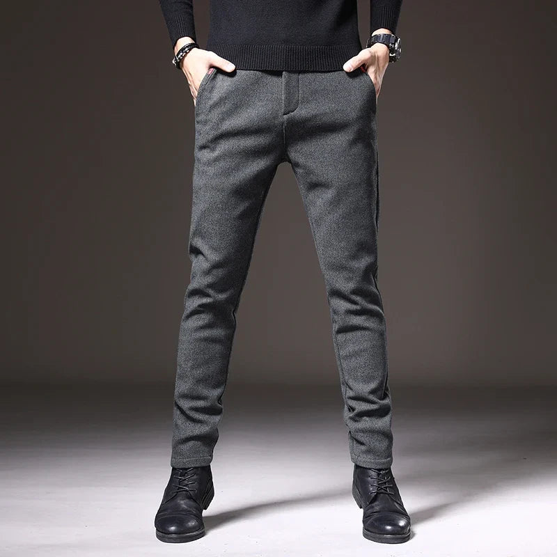 Casual blue men's stretch trousers with a modern slim fit, perfect for weekend comfort.