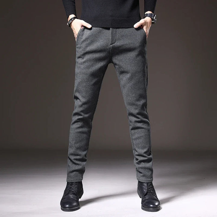 Casual blue men's stretch trousers with a modern slim fit, perfect for weekend comfort.