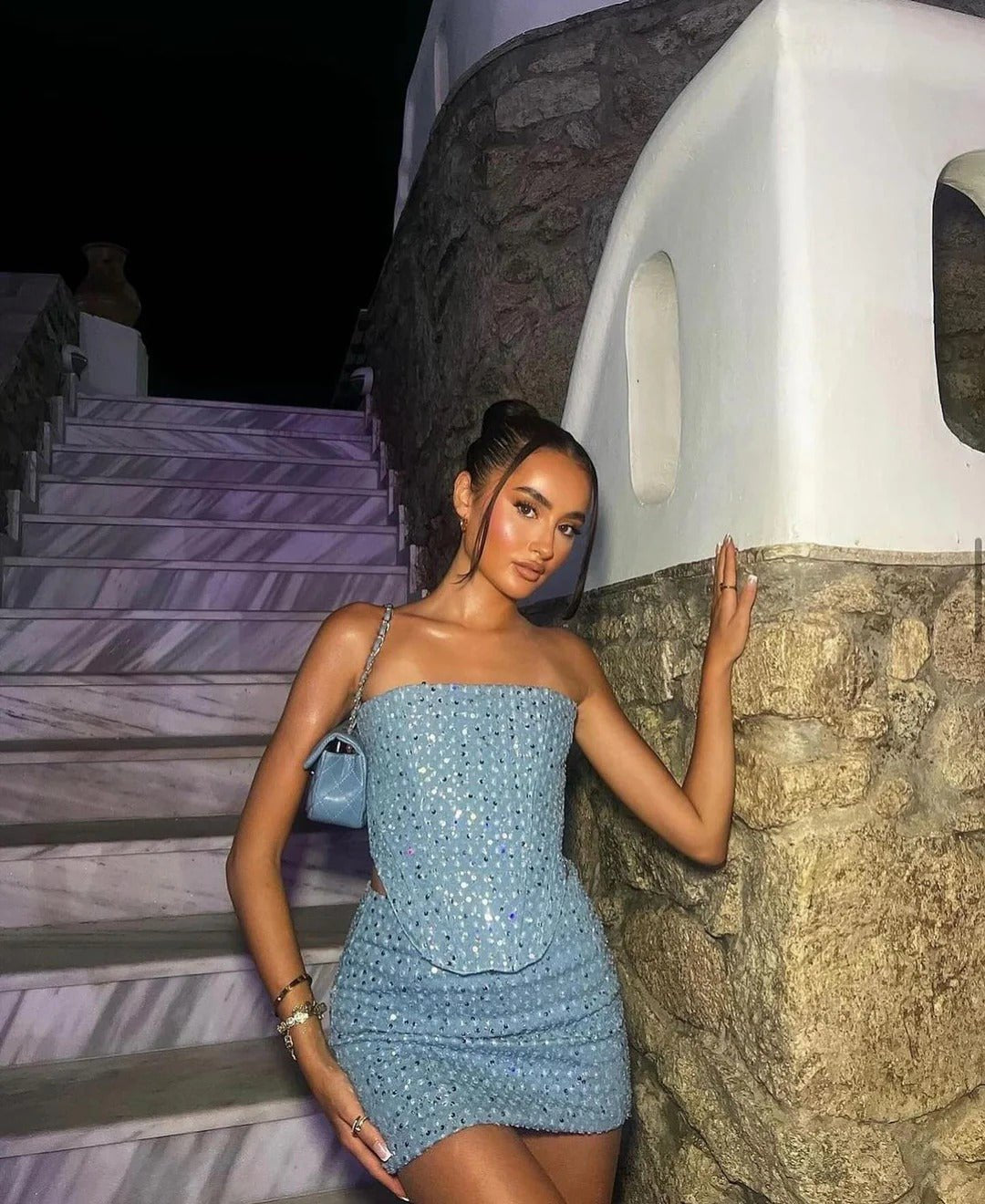 Glamorous blue sequin strapless mini dress. Bodycon fit, ideal for cocktail parties, evening, and formal events.