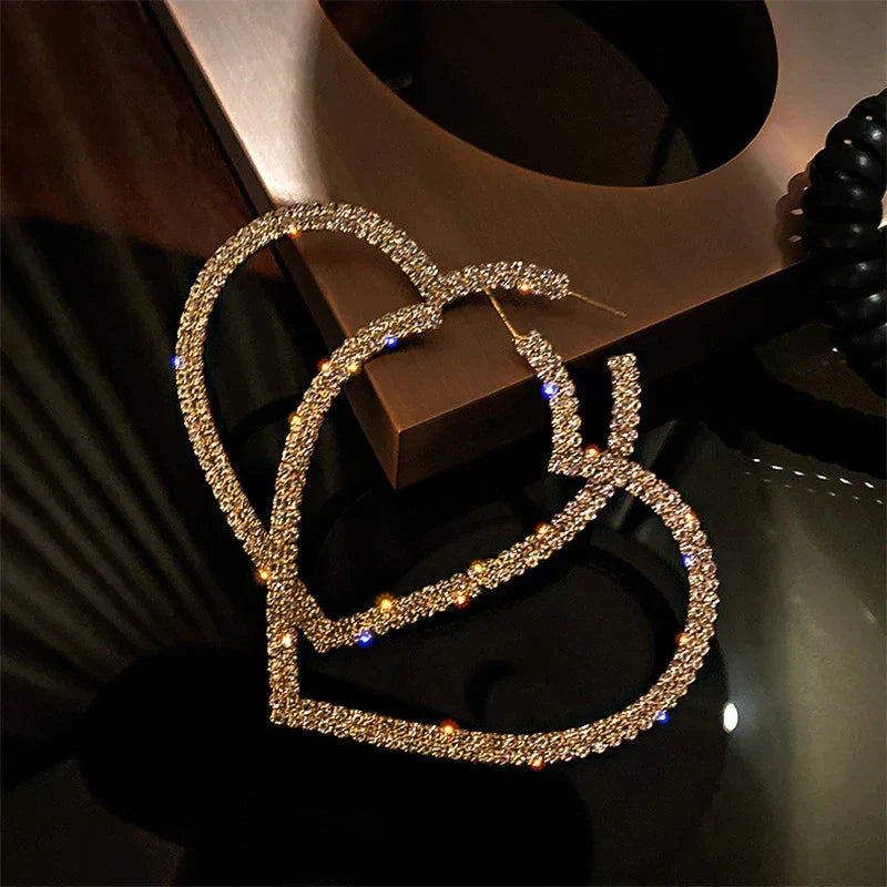Dazzling large crystal heart earrings for women. Sparkle with style, perfect fashion jewelry statement.