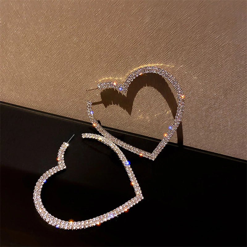 Women's large heart-shaped crystal earrings, a sparkling gift for her. Fashionable and eye-catching jewelry.