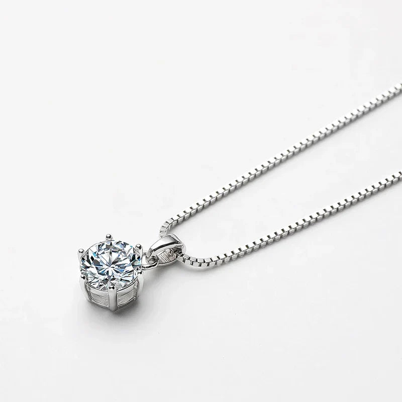 Sparkling moissanite pendant necklace for women, crafted from sterling silver, dazzling fine jewelry.