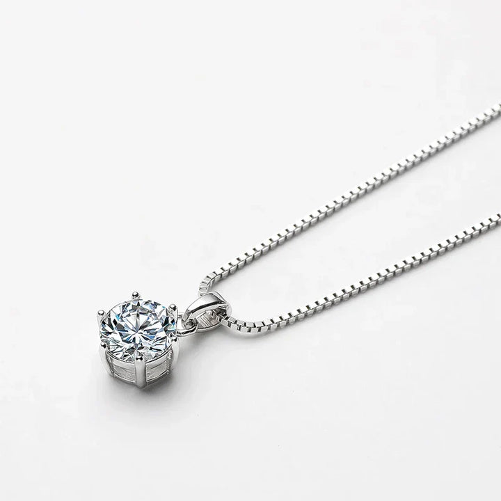 Sparkling moissanite pendant necklace for women, crafted from sterling silver, dazzling fine jewelry.
