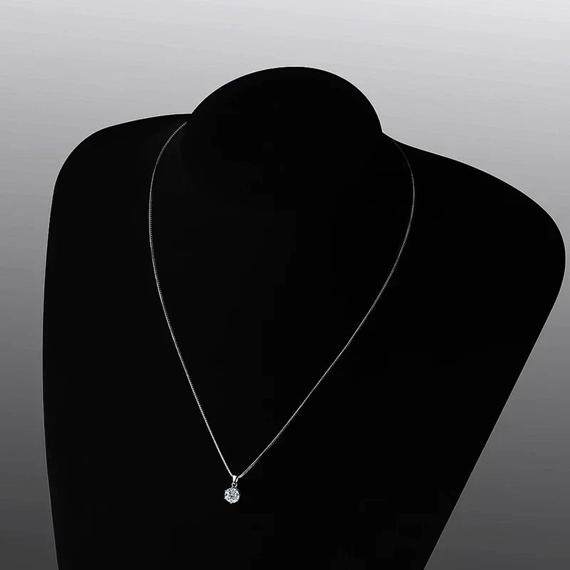 Elegant women's gift: a dazzling moissanite necklace, sterling silver, perfect for sparkle and style.