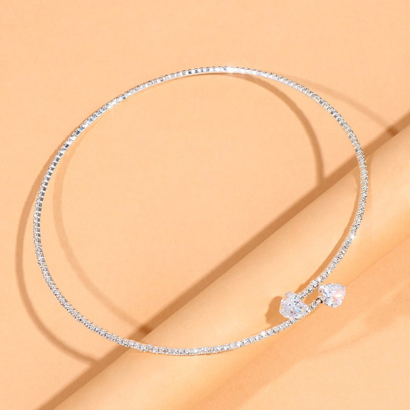 Close-up of a women's sparkling rhinestone choker, elegant fashion jewelry with brilliant crystals, adjustable.