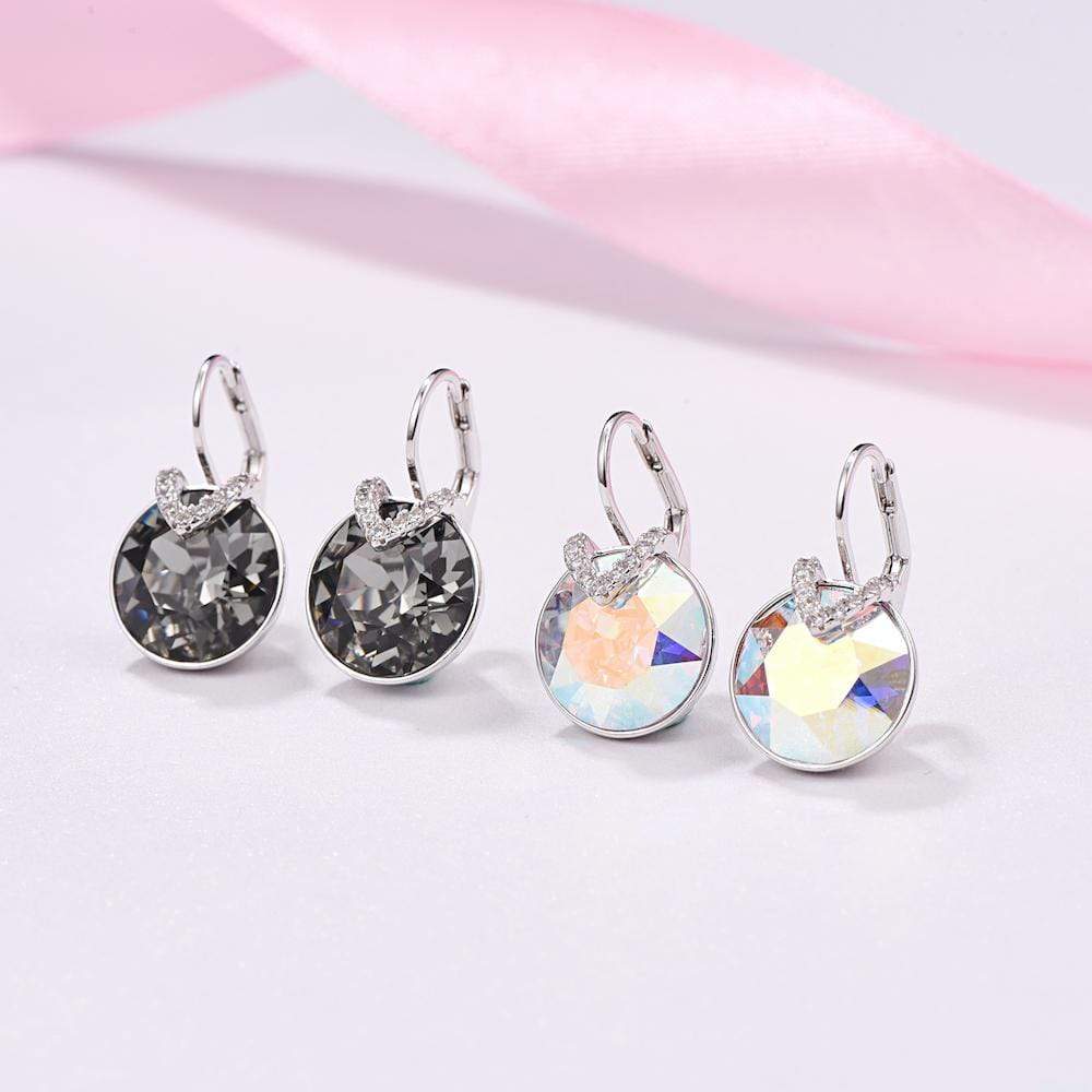 Statement silver drop earrings for women, featuring dazzling sparkle and elegant design.